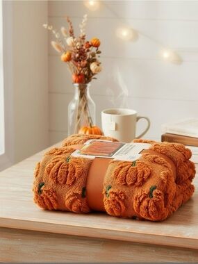 TikTok Viral Costco Orange Pumpkin Knit Throw Blanket with Green Accents